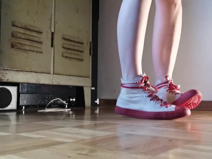 Naked under her coat, her chucks turn her on and makes her horny