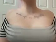 Tattooed alt girl shakes and plays with her boobs