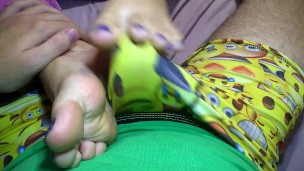 Footjob in pants made him cum through underwear