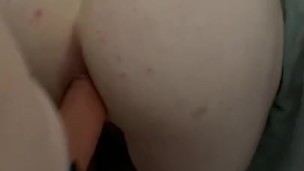 Trans girl takes her domme wife’s huge strap on cock 