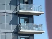 Lexxi Love cums on her balcony for all the neighbours to see 2/16