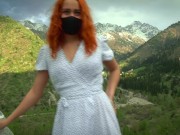 Sexy girl in a dress decided to have fun on the background of the mountains 6/16