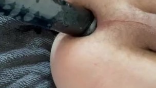 Shoving a 2 inch thick black dildo in my ass…