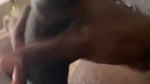 Laying Back Stroking Black Dick