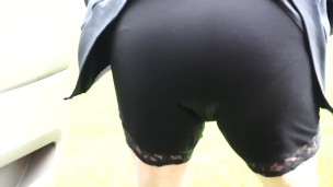 Desperate leggings pee along the road 