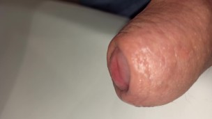 closeup foreskin while peeing