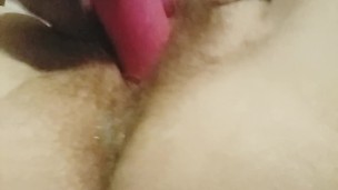 Close Up of Girl Using Vibrating Toys on her Hairy Pussy