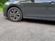 Lustful brunette plays with her pussy in the car 1/16