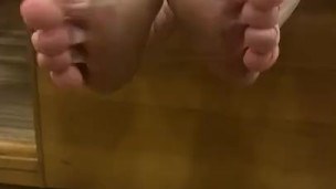 Feet scrunching toe wiggling