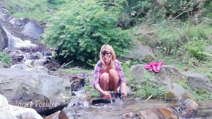 Dirty babe pissing, washing panties, ass, pussy & feet in the Waterfall stream near tourist camp