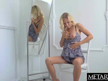 Hot sexy blonde watches herself in the mirror as she masturbates