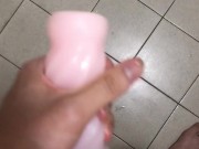 Masturbating in the bathroom, I fucked that stroker so hard and came inside