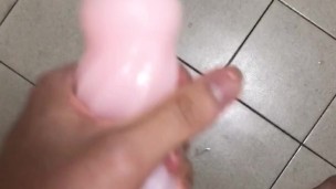 Masturbating in the bathroom, I fucked that stroker so hard and came inside