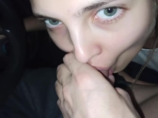 POV Amazing teen gives a blowjob in the car while it’s raining outside to cheer him up and swallows