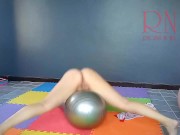 Regina Noir. A woman in yoga leotards practices yoga in the gym. Transparent red leotard yoga. 2 14/16