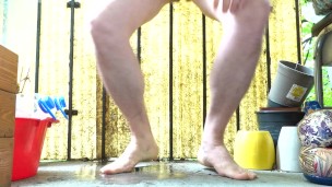 a man pee on the balcony with female underwear.