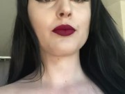 Casually smoking a cork cigarette with dark lipstick on 13/16