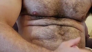 MUSCLE BEAR FLEXING AND CUMS IN GLASS