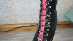 Mistress Katrix show her high heels and latex pants