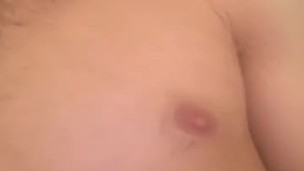 Horny male rubbing nipple