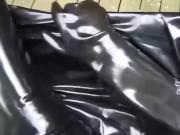 Latex girl full in black rubber and Gasmask chill outs outdoor in garden in a heavy rubber hammock 12/16