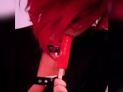Goth babe licking & sucking red blowpop