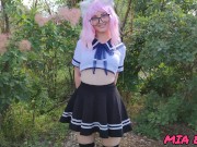 Sexy schoolgirl with ears in uniform walks down the abandoned road