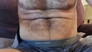 MUSCLE BEAR IN STRIPED BOXER BREIFS FLEXING ARMS AND CHEST!