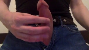 Close-up hard cock and cum at camera after a quick wank