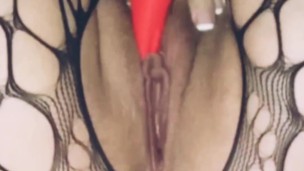 Amazing squirting orgasms while teen vibrates her pussy and clit in fishnets!