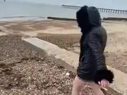British babe Smoking and flashing on the beach 