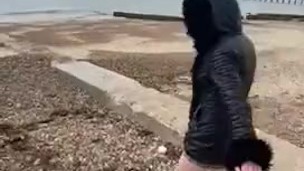 British babe Smoking and flashing on the beach 