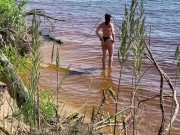 Sexy nudist girl on a wild beach