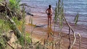 Sexy nudist girl on a wild beach
