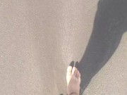 Pies en la playa