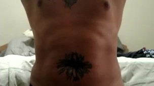 Sexy tattoo guy showing off in new underwear