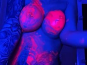 babe in neon in paint plays with pussy