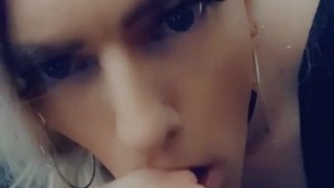 Sissy gently sucks dildo cock