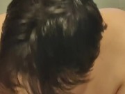 Sucking the dildo 