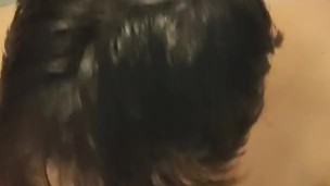 Sucking the dildo 