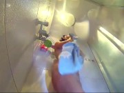 Voyeur camera in the shower. Young nude girl rubs her body with massage oil 1/16