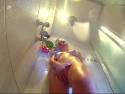 Voyeur camera in the shower. Young nude girl rubs her body with massage oil 13/16