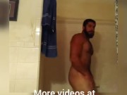 Hot Bodybuilder Flexing in Shower