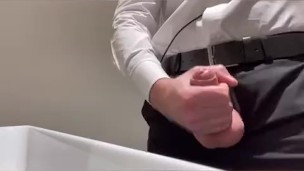Toilet handjob and cum