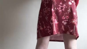 Sissy in permanent chastity cage under long skirt