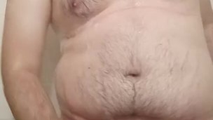 Jerking off and ass spanking in the shower