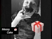 Messy eating birthday cake