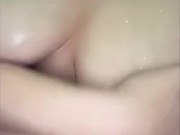 Plays with tits in shower