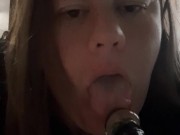 Sexy brunette teasing you with her glass dildo