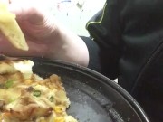 Video of a fat pig eating pizza for lunch.